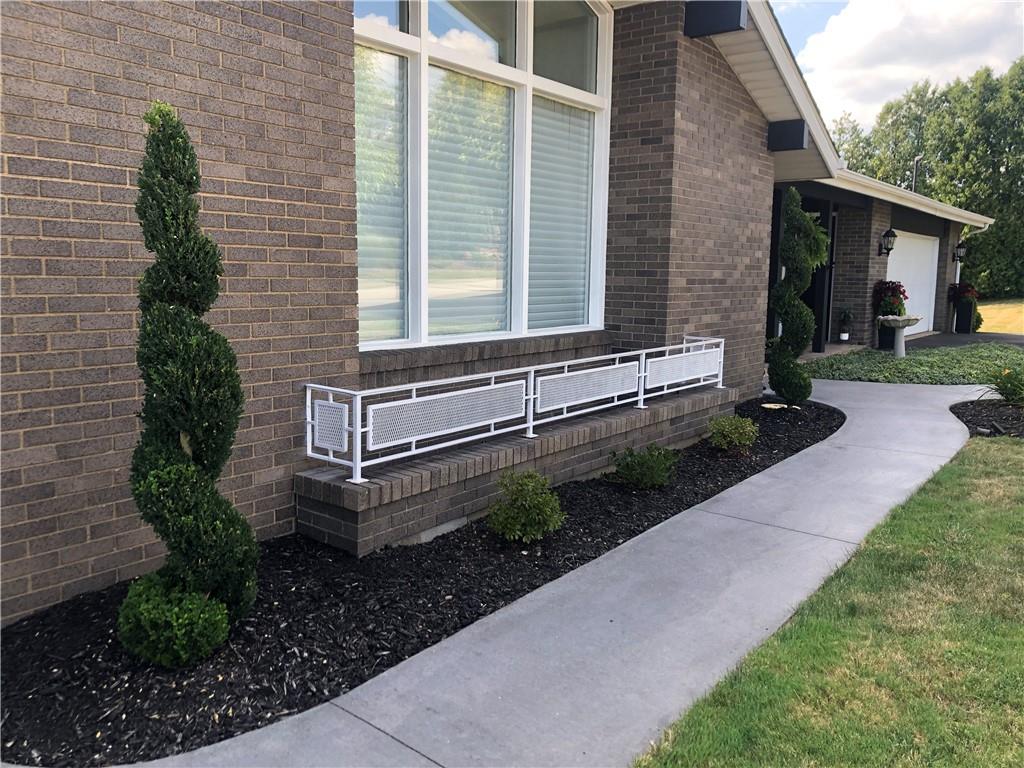 107 Spring Lane Uniontown, PA 15401 - Photo 6 of 50 a view of a house with backyard and garden