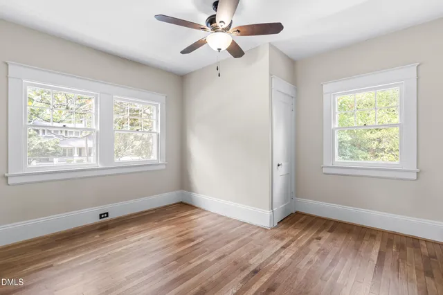 a white sink and a mirror