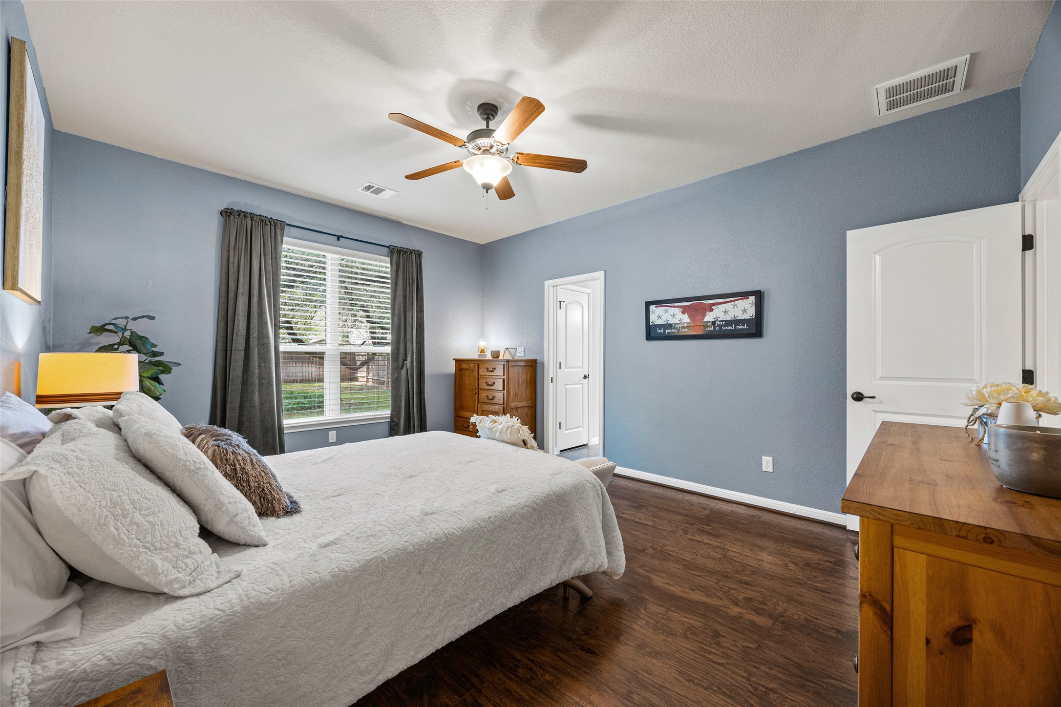 3451 Mayfield Ranch Boulevard, Unit 201 Round Rock, TX 78681 - Photo 16 of 29 a bedroom with a bed and window