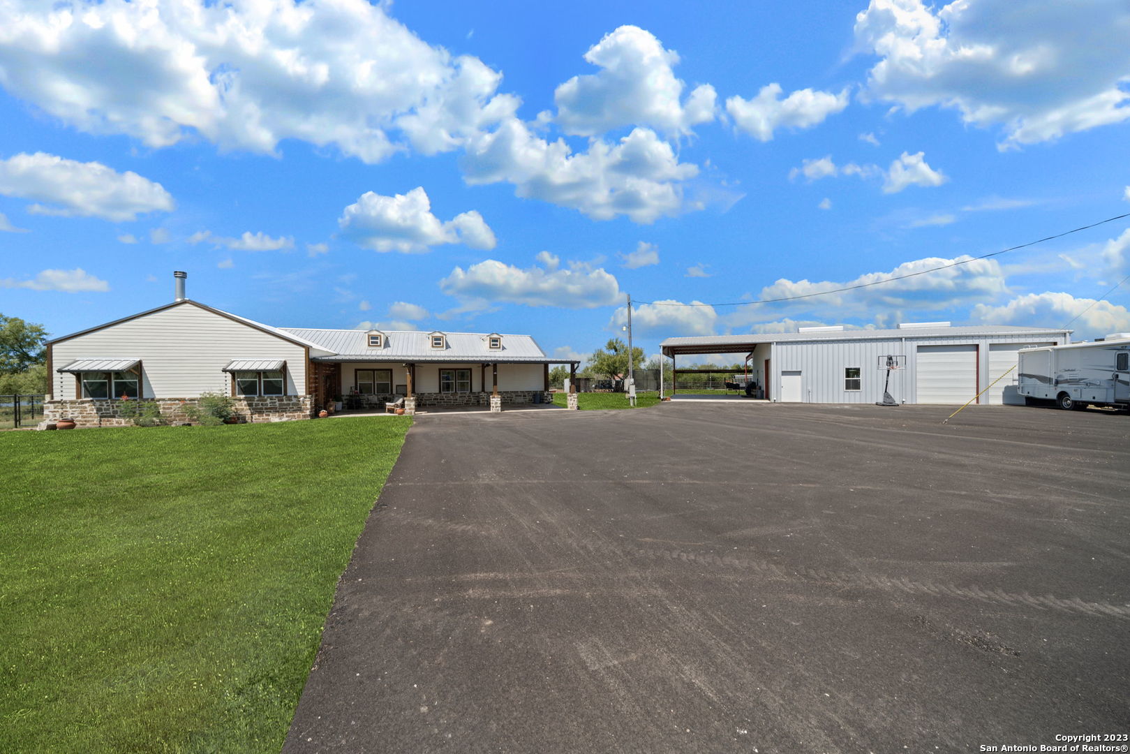 4842 County Road 4514 Hondo, TX 78861 - Photo 1 of 1 a front view of house with yard
