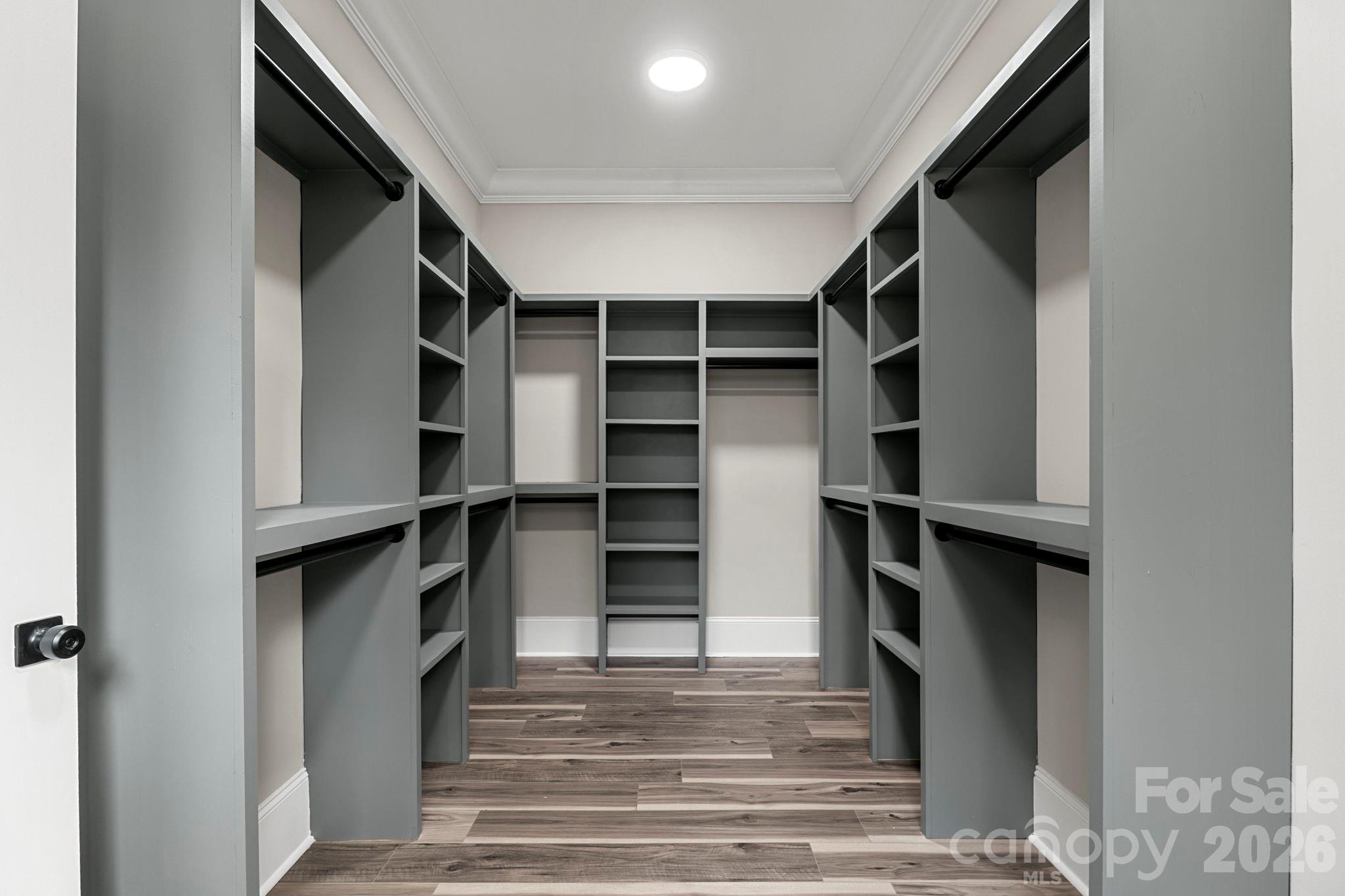 918 North New Hope Road Gastonia, NC 28054 - Photo 26 of 37 a view of walk in closet with empty racks