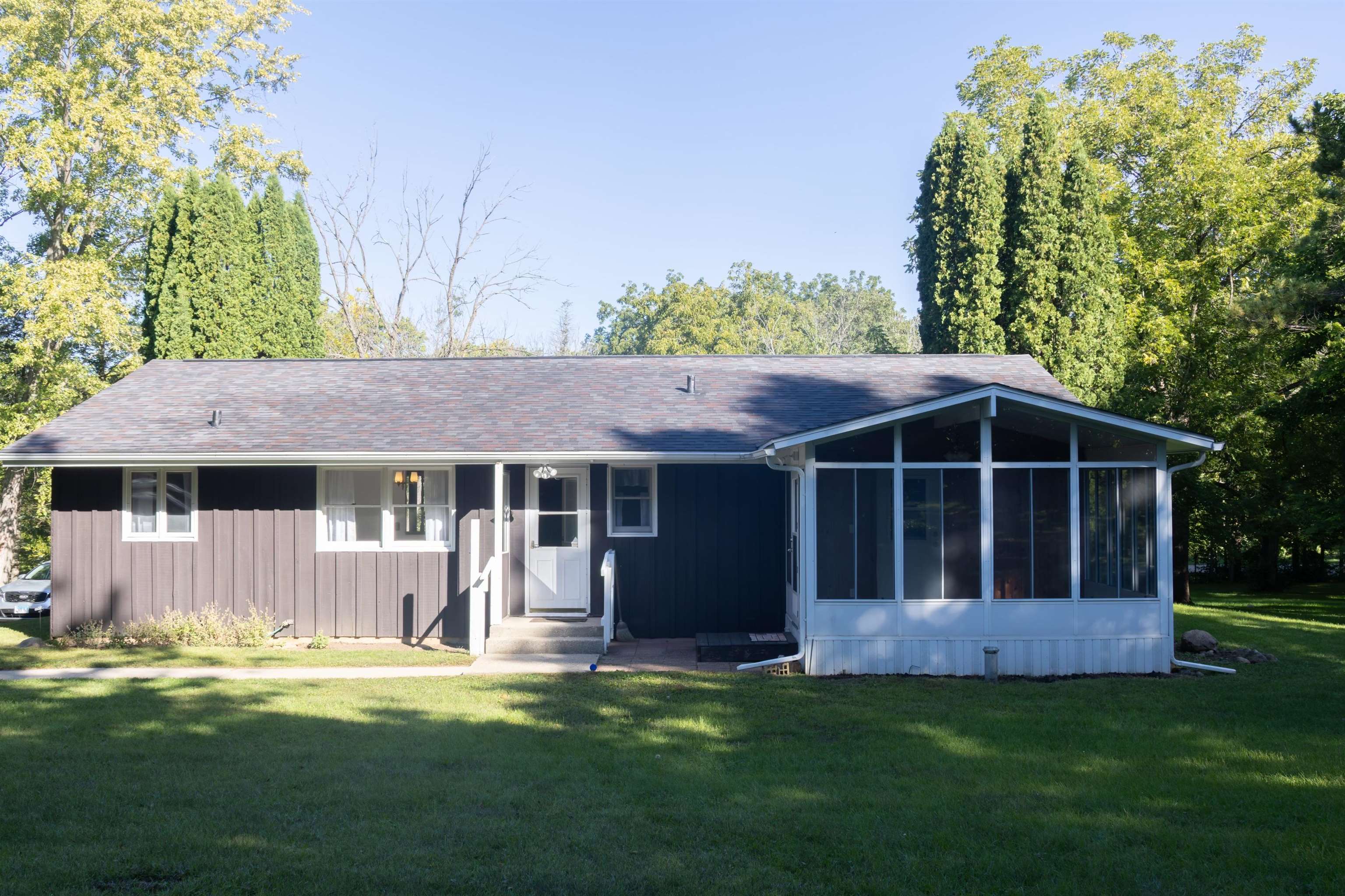 10520 Cemetery Road Pecatonica, IL 61063 - Photo 16 of 23 a view of a house with a yard