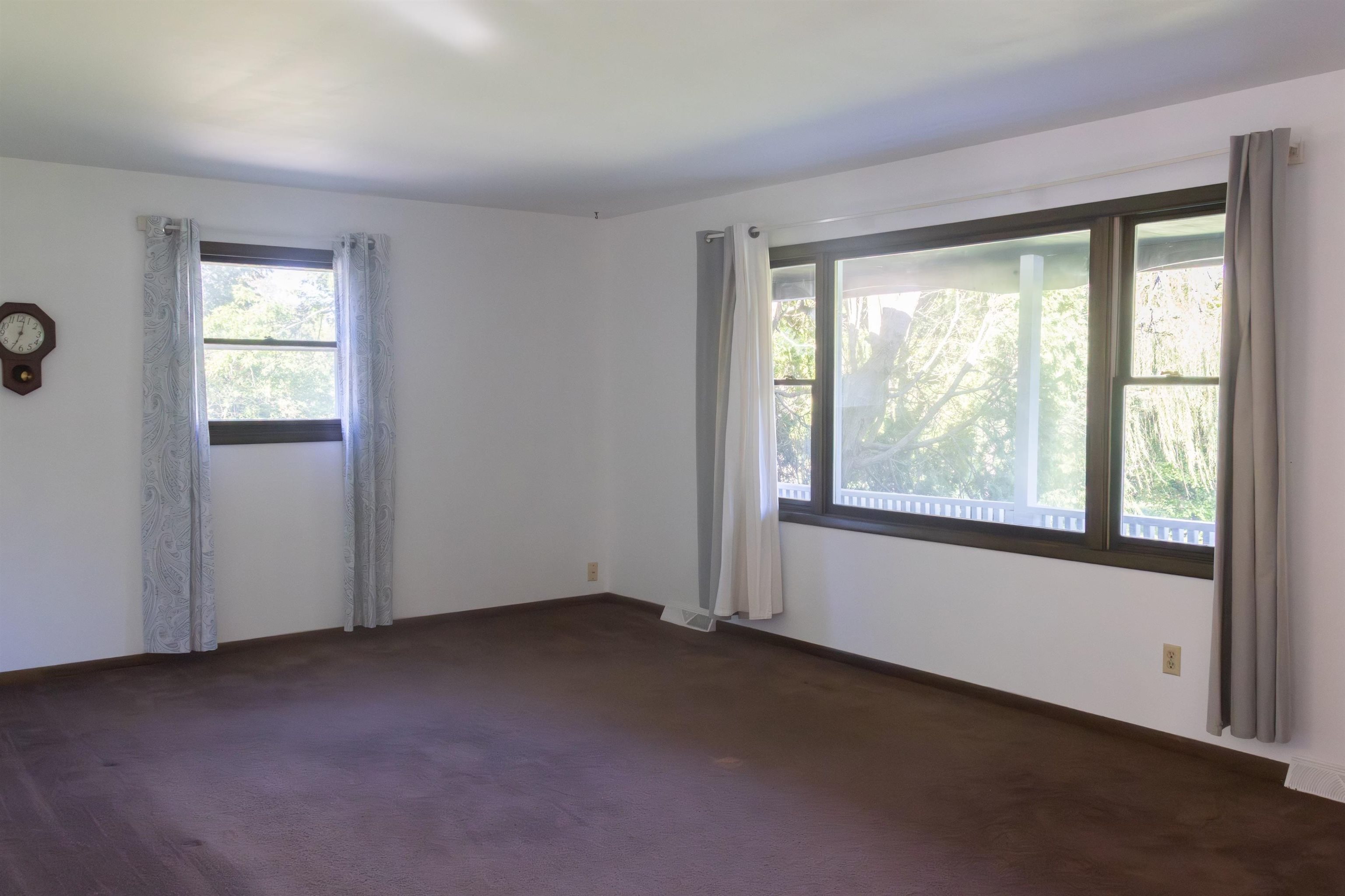 10520 Cemetery Road Pecatonica, IL 61063 - Photo 2 of 23 an empty room with a window