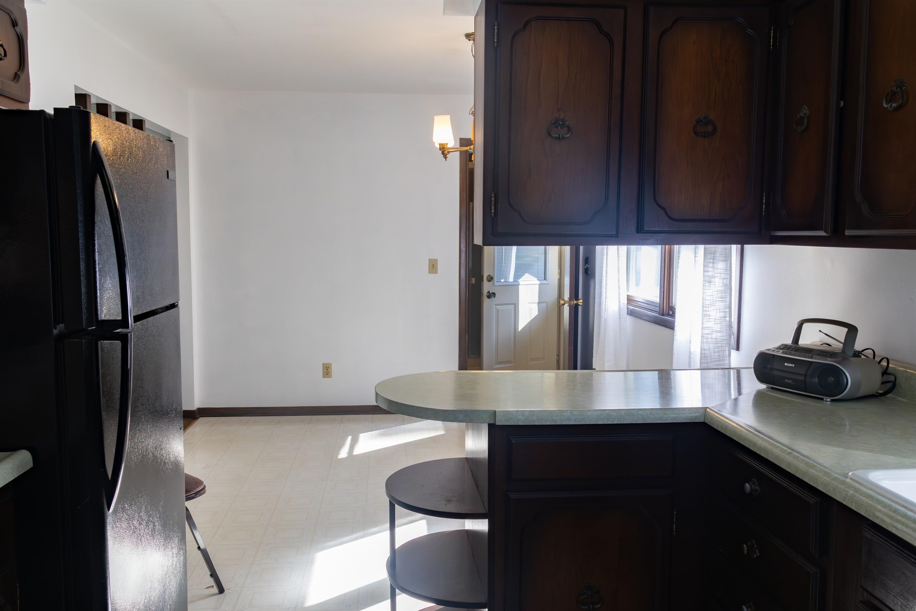 10520 Cemetery Road Pecatonica, IL 61063 - Photo 4 of 23 a kitchen with cabinets and a stainless steel appliances
