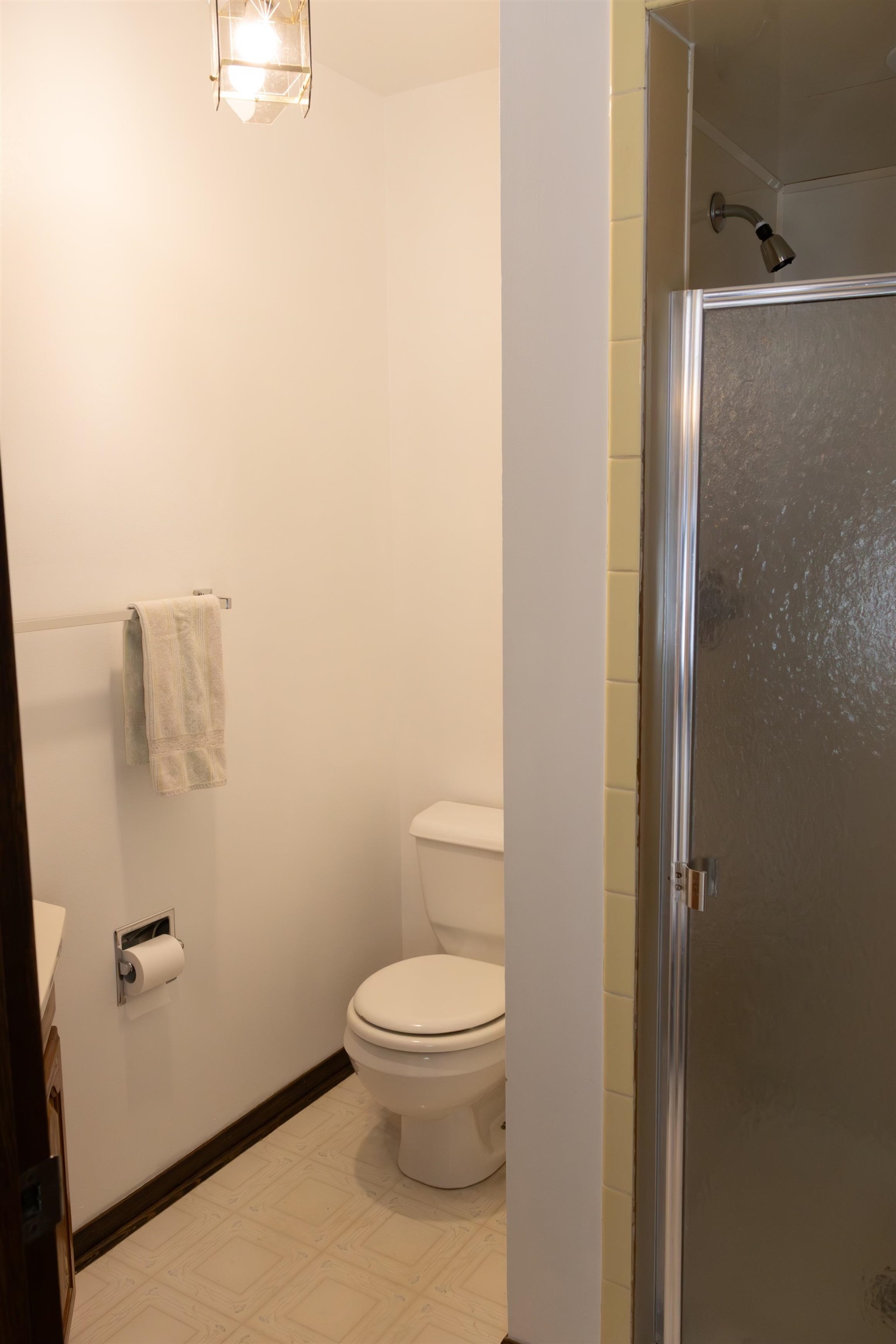 10520 Cemetery Road Pecatonica, IL 61063 - Photo 5 of 23 a white toilet sitting next to a shower