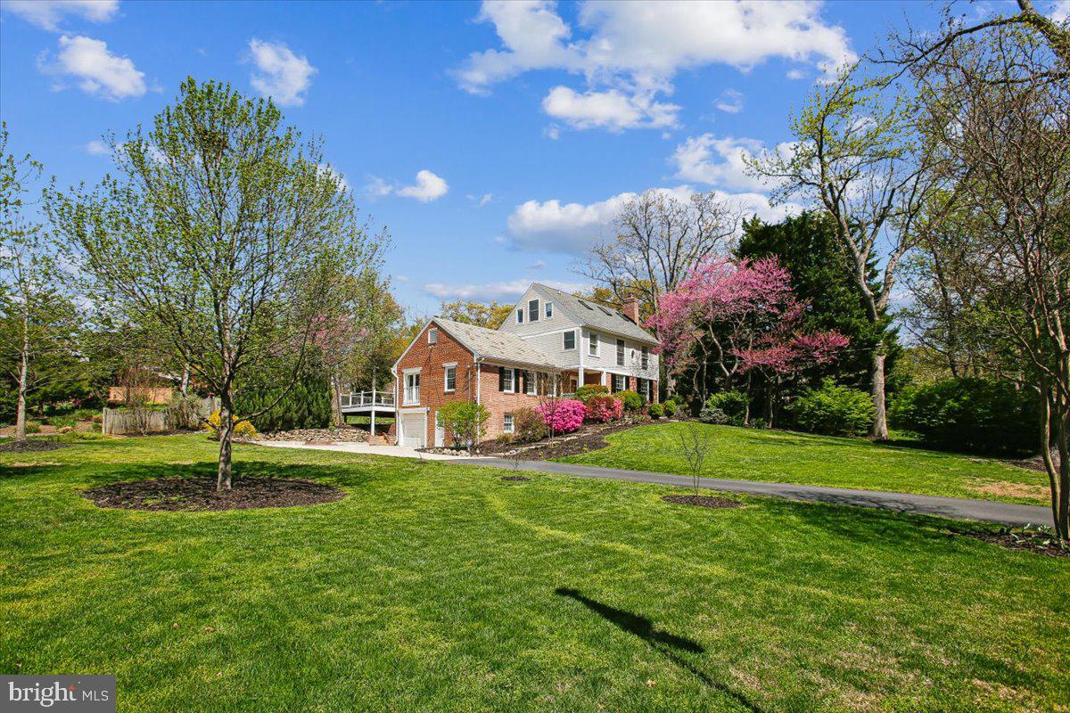 1305 Key Drive Alexandria, VA 22302 - Photo 44 of 64 a view of a house with a big yard and a palm tree