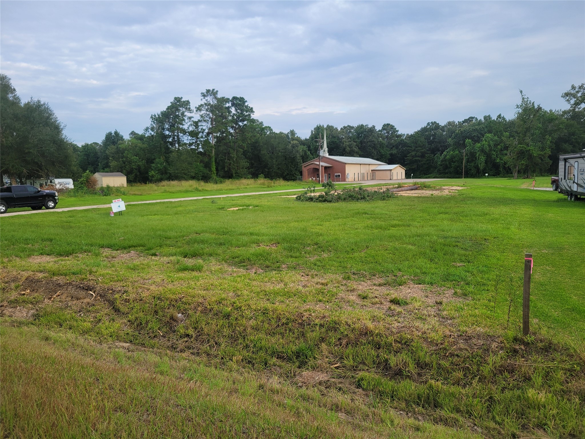 217 Albritton Gully Road Hankamer, TX 77560 - Photo 5 of 6 a front view of a house with a yard