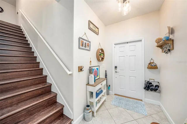 a view of entryway with a front door