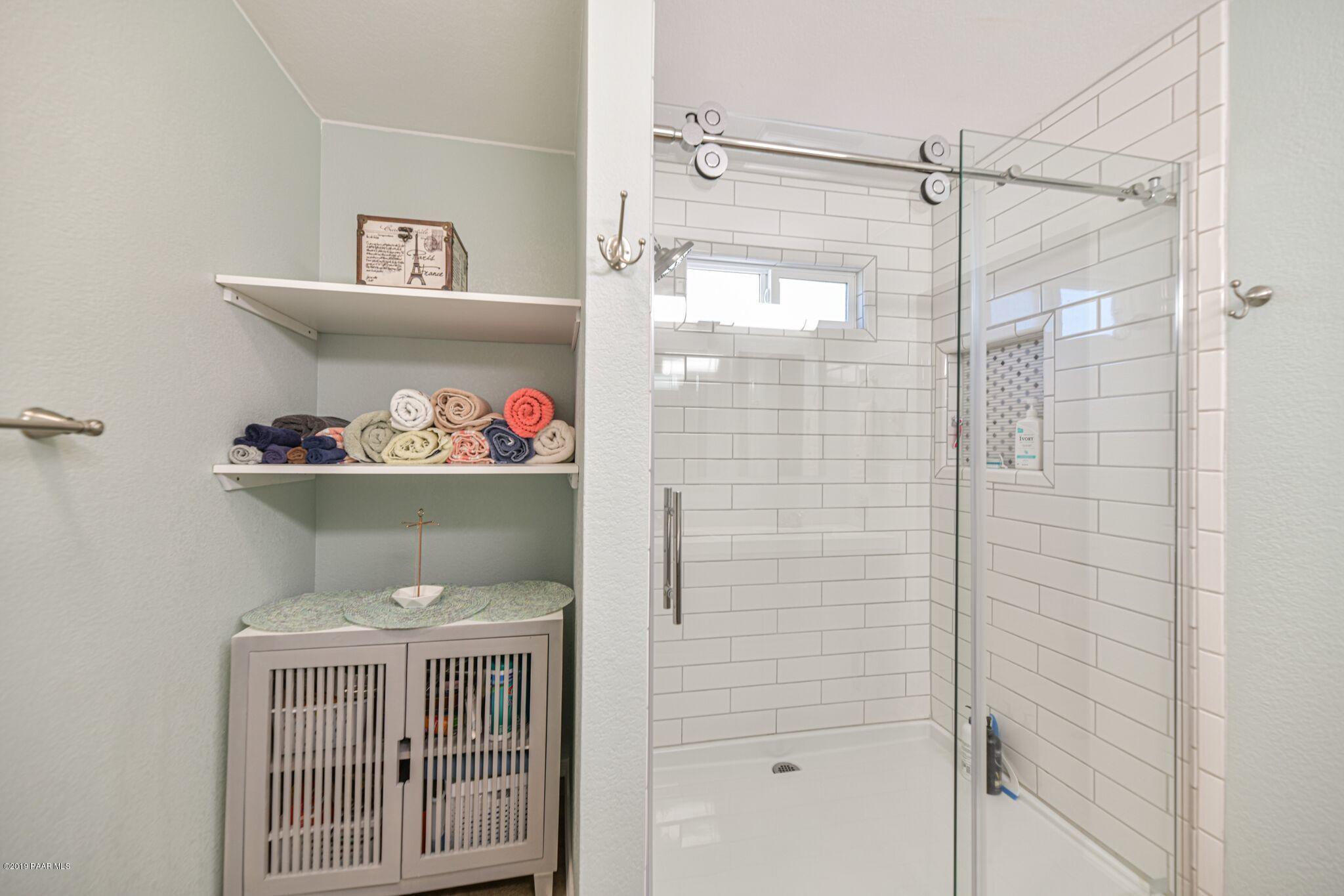 1500 Copper Basin Road Prescott, AZ 86303 - Photo 12 of 42 Master Shower and storage shelves