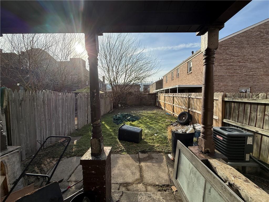 1205 Penn Street Pittsburgh, PA 15215 - Photo 13 of 49 a backyard of a house with outdoor seating