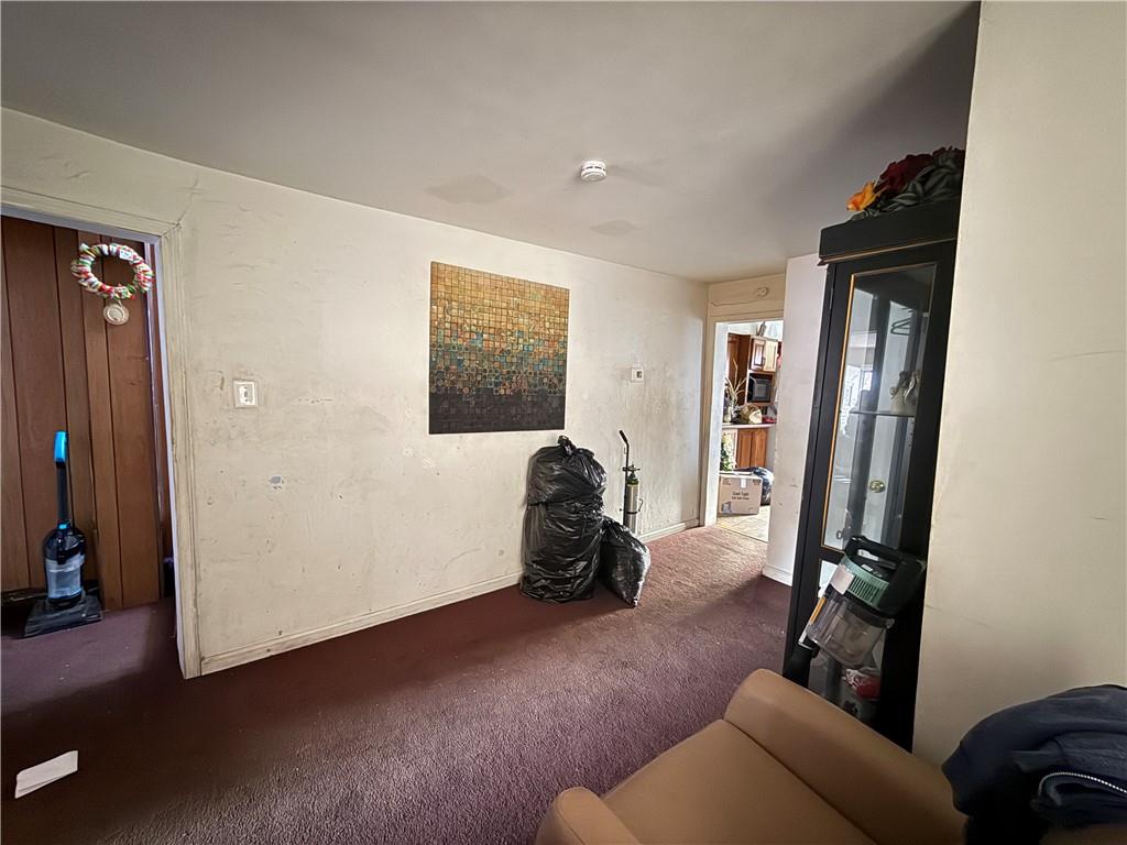 1205 Penn Street Pittsburgh, PA 15215 - Photo 19 of 49 a room with furniture and a window