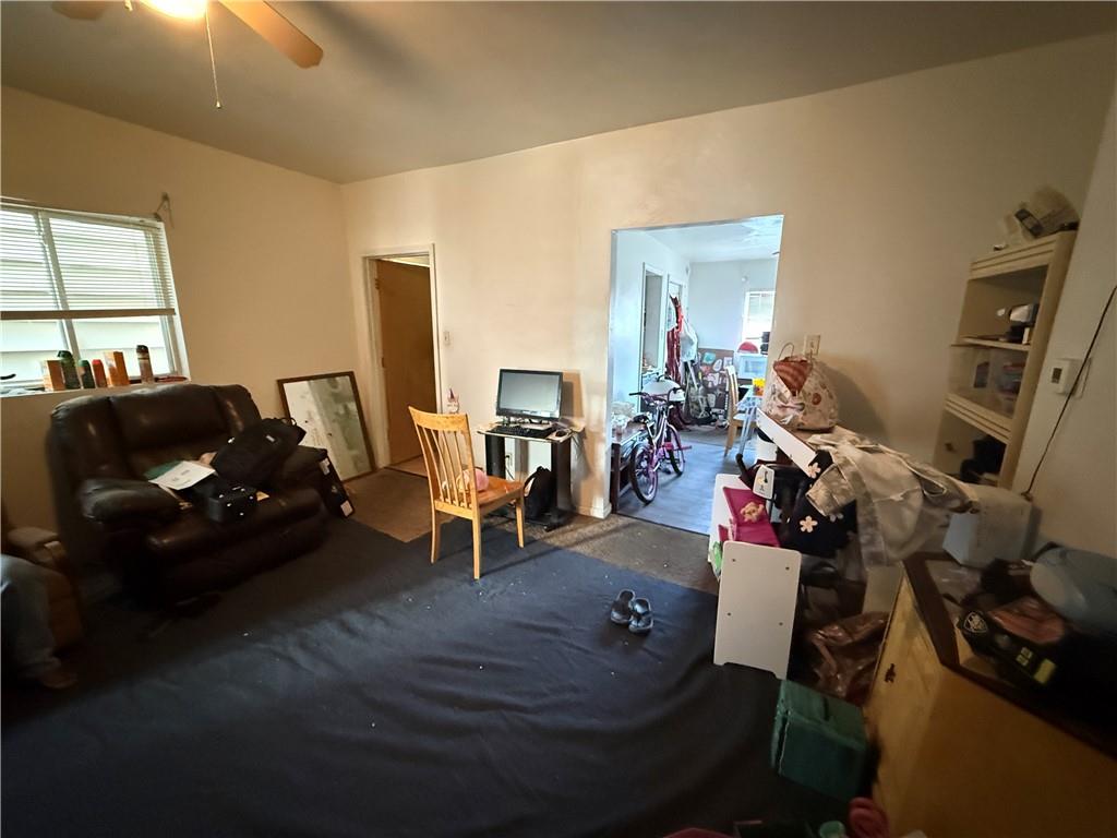 1205 Penn Street Pittsburgh, PA 15215 - Photo 27 of 49 a living room with furniture and a flat screen tv