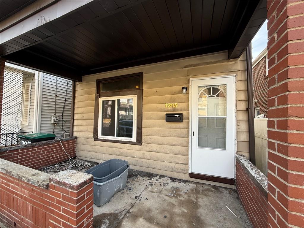 1205 Penn Street Pittsburgh, PA 15215 - Photo 3 of 49 a view of house with backyard