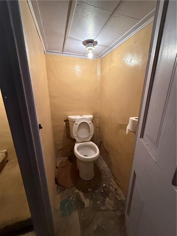 1205 Penn Street Pittsburgh, PA 15215 - Photo 32 of 49 a bathroom with a toilet and a shower