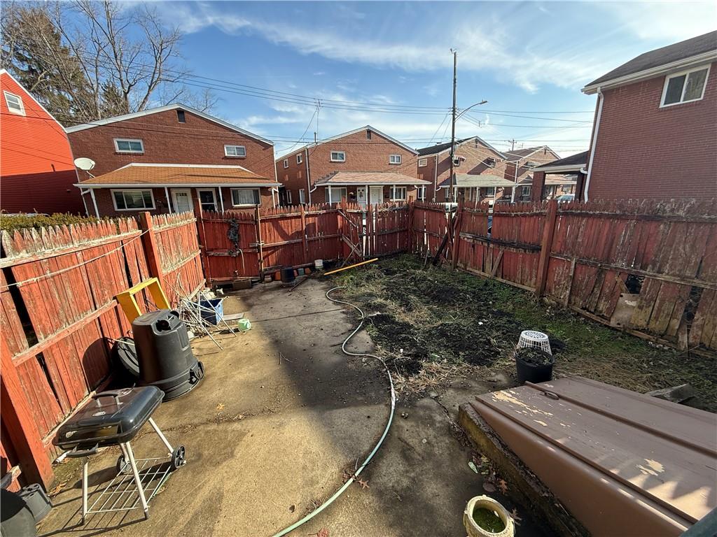 1205 Penn Street Pittsburgh, PA 15215 - Photo 34 of 49 a view of a chairs and table in backyard