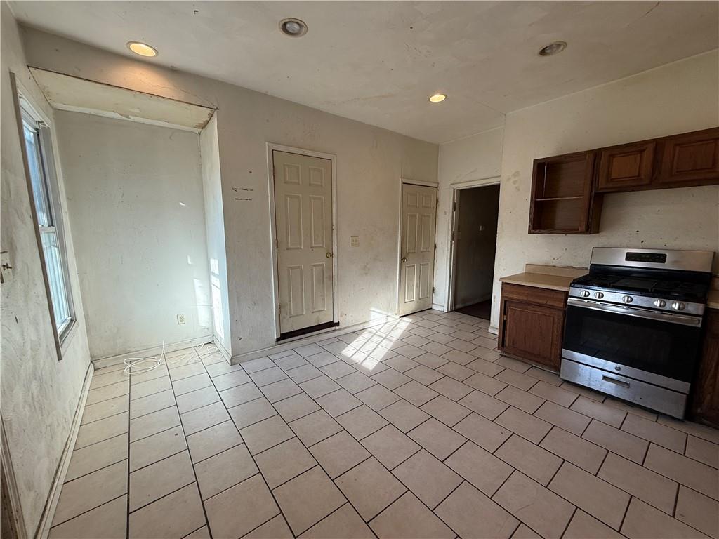 1205 Penn Street Pittsburgh, PA 15215 - Photo 9 of 49 a view of kitchen with refrigerator and window