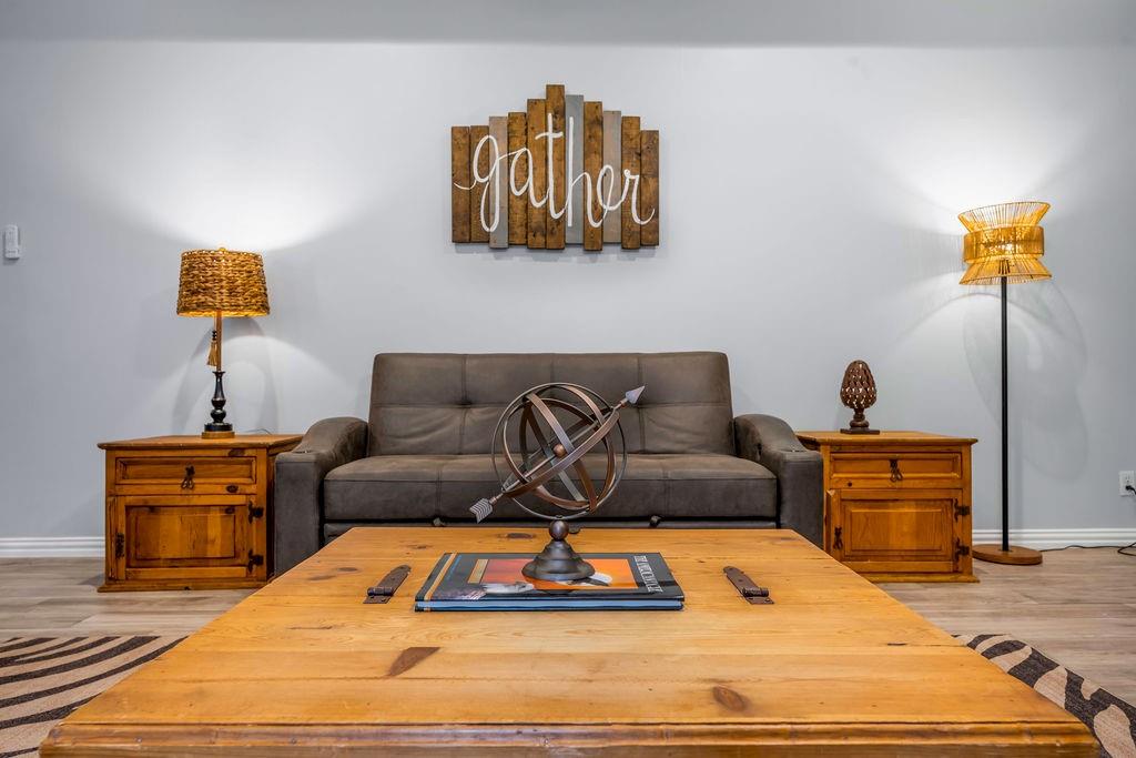 3330 Timberview Road Dallas, TX 75229 - Photo 14 of 39 Living room featuring light hardwood / wood-style floors