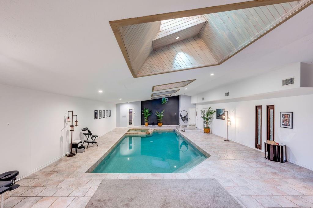 3330 Timberview Road Dallas, TX 75229 - Photo 16 of 39 View of swimming pool with a skylight