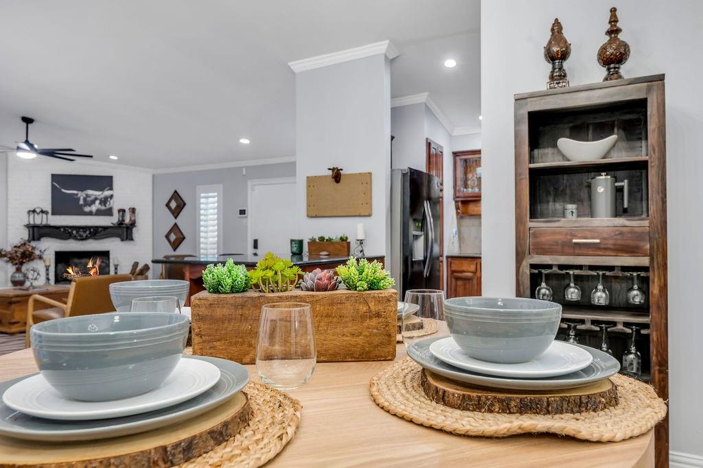 3330 Timberview Road Dallas, TX 75229 - Photo 23 of 39 Living room featuring ceiling fan and crown molding