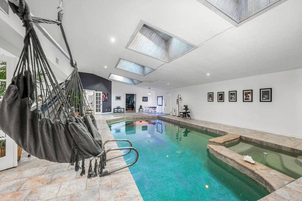 3330 Timberview Road Dallas, TX 75229 - Photo 32 of 39 View of pool with a skylight