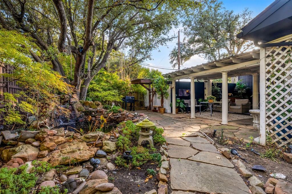 3330 Timberview Road Dallas, TX 75229 - Photo 39 of 39 View of yard featuring a pergola and a patio