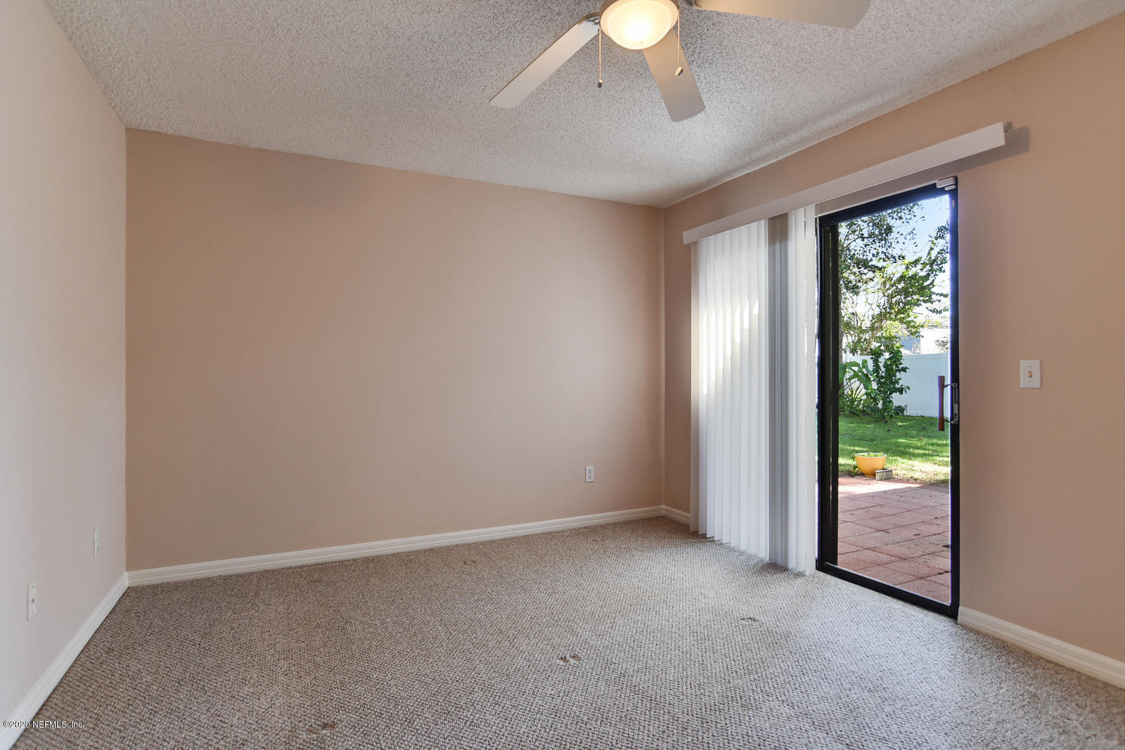 8333 Gemini Road Jacksonville, FL 32216 - Photo 18 of 25 Master Backyard View and slider
