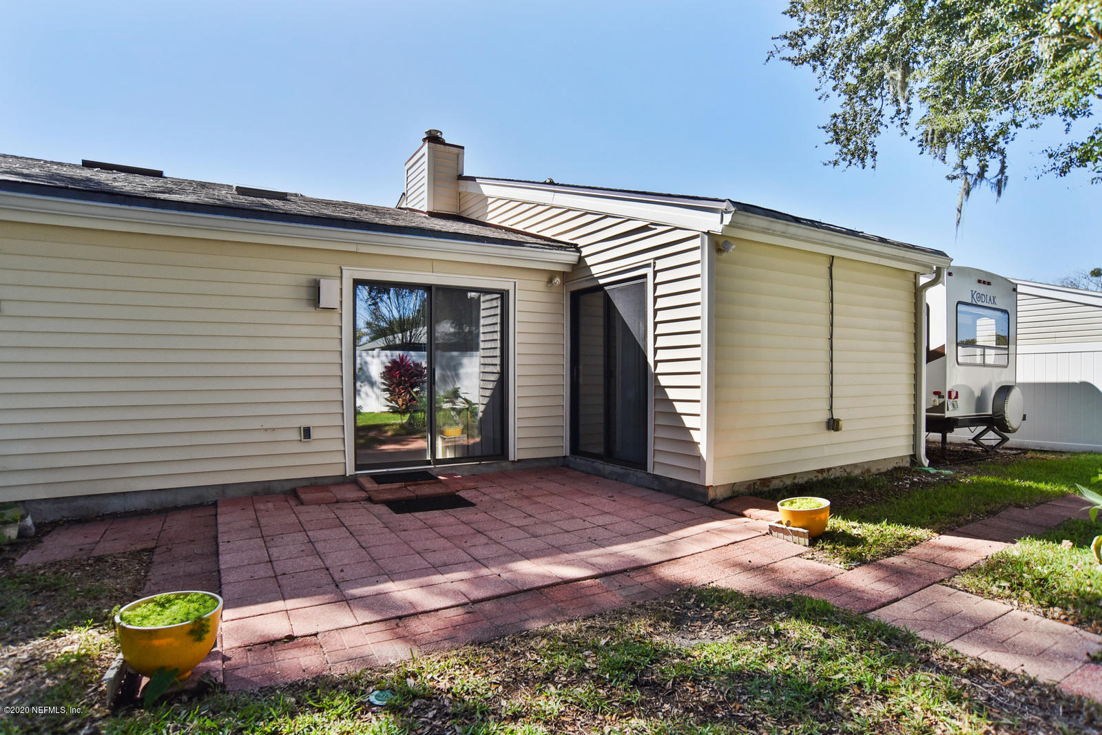 8333 Gemini Road Jacksonville, FL 32216 - Photo 19 of 25 Backyard Patio