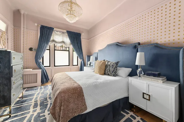 a view of hallway with wooden floor