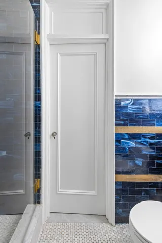 a bathroom with a sink a vanity and mirror