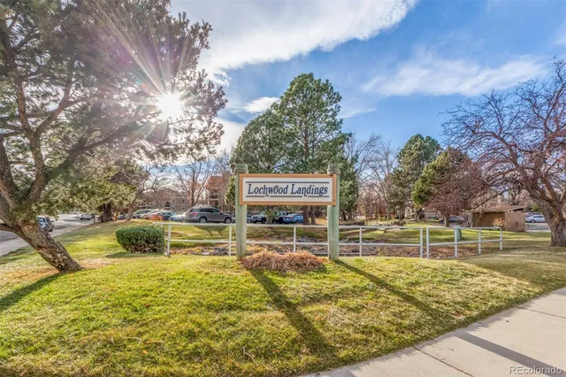 a view of a swimming pool with an outdoor seating