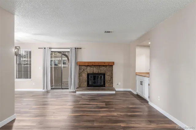 a view of a livingroom with a fireplace