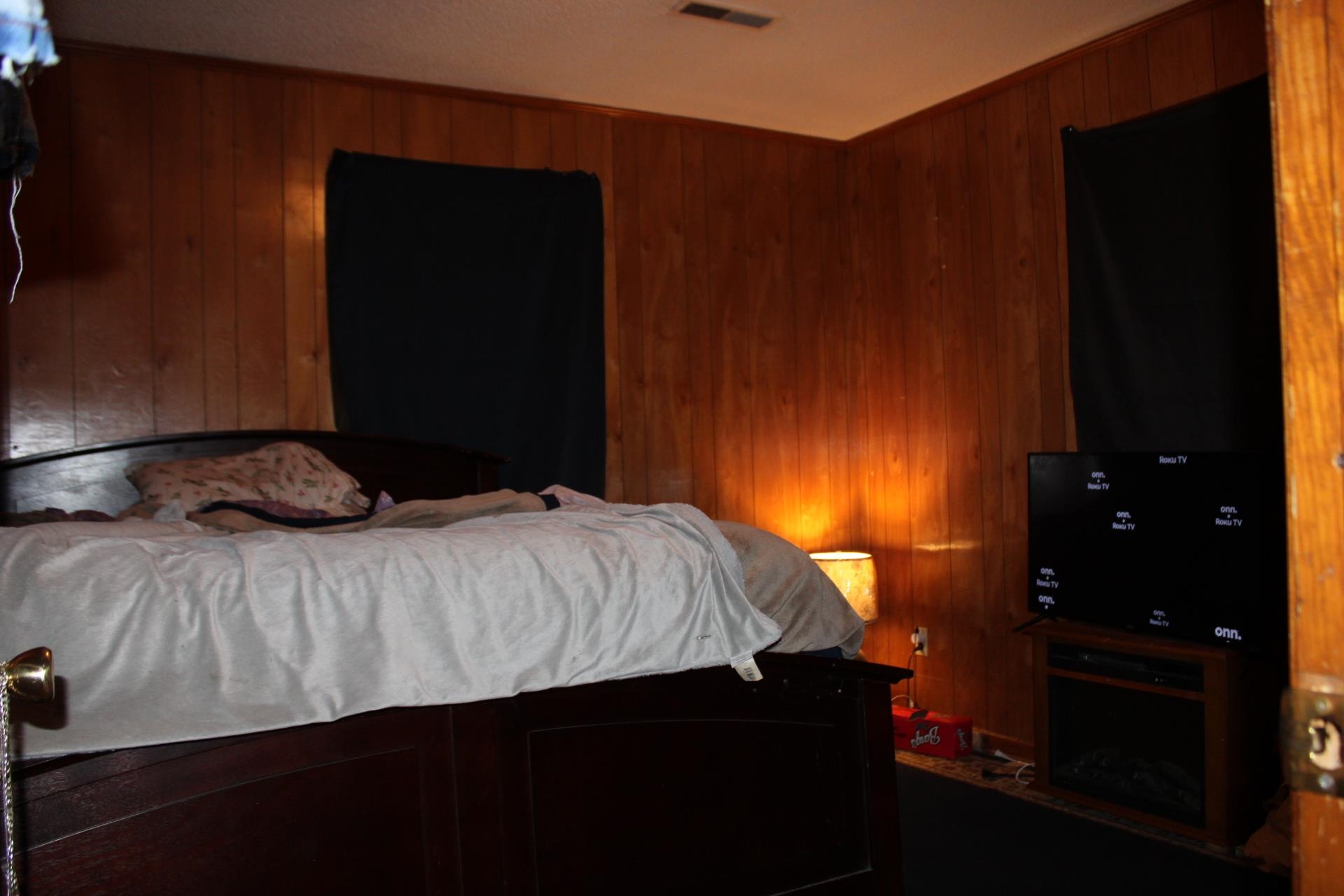 187 Land Avenue Ripley, TN 38063 - Photo 13 of 22 a bedroom with a bed and a night stand