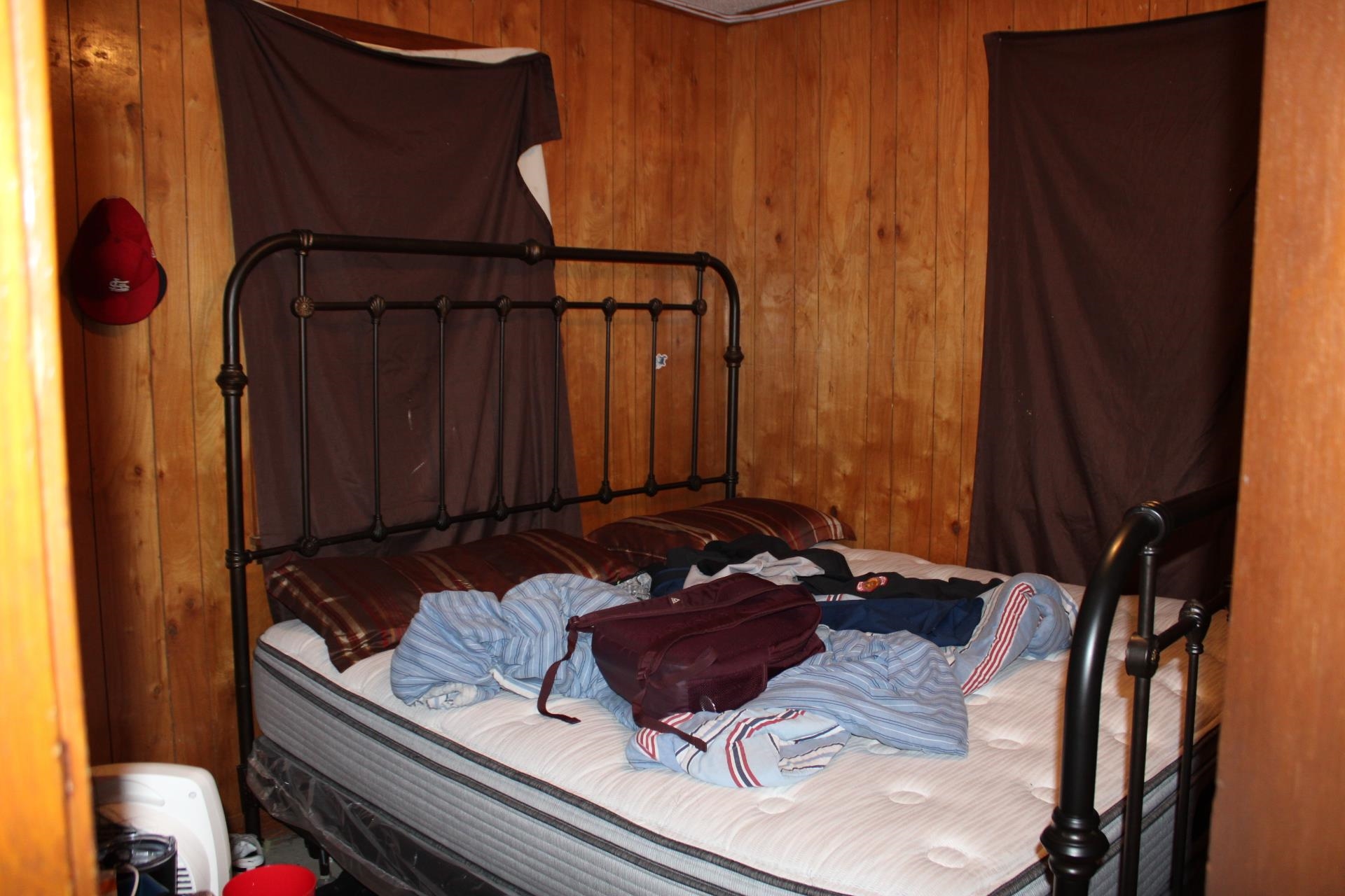 187 Land Avenue Ripley, TN 38063 - Photo 15 of 22 a bed sitting in a bedroom next to a window