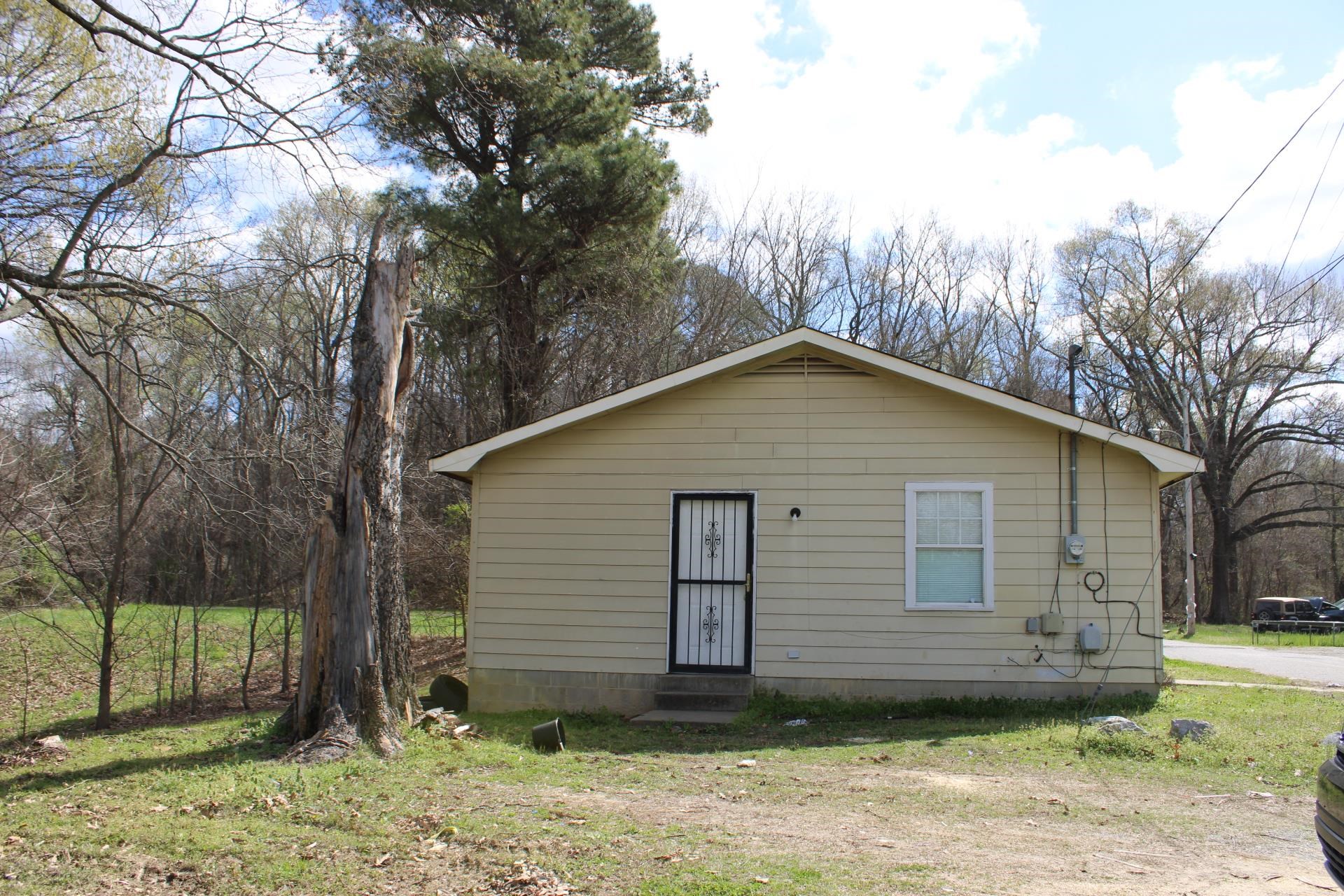 187 Land Avenue Ripley, TN 38063 - Photo 3 of 22 a view of a house with a yard