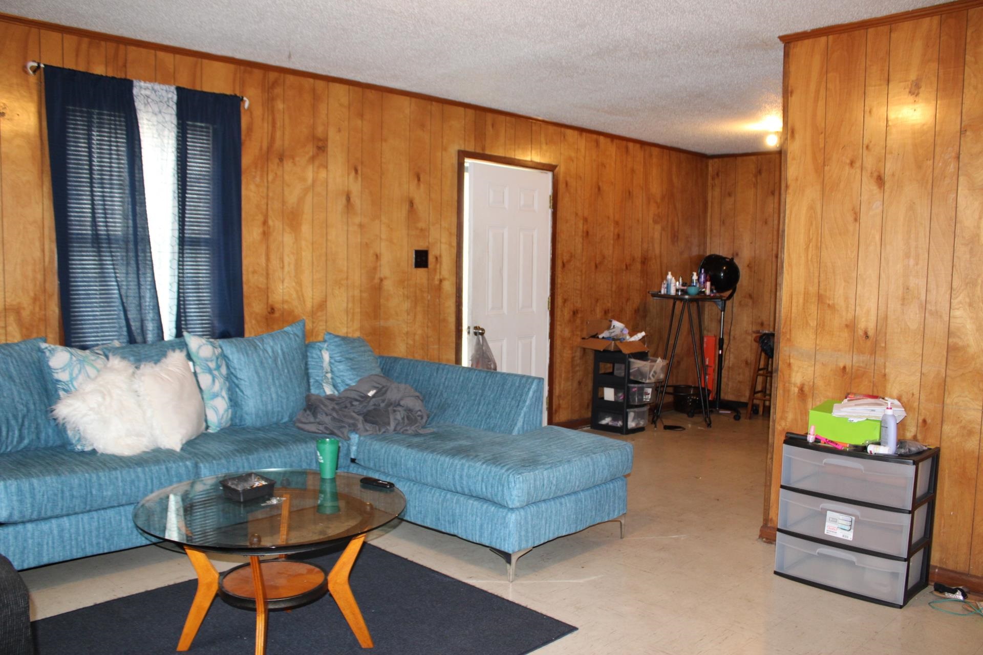 187 Land Avenue Ripley, TN 38063 - Photo 6 of 22 a living room with furniture and a lamp