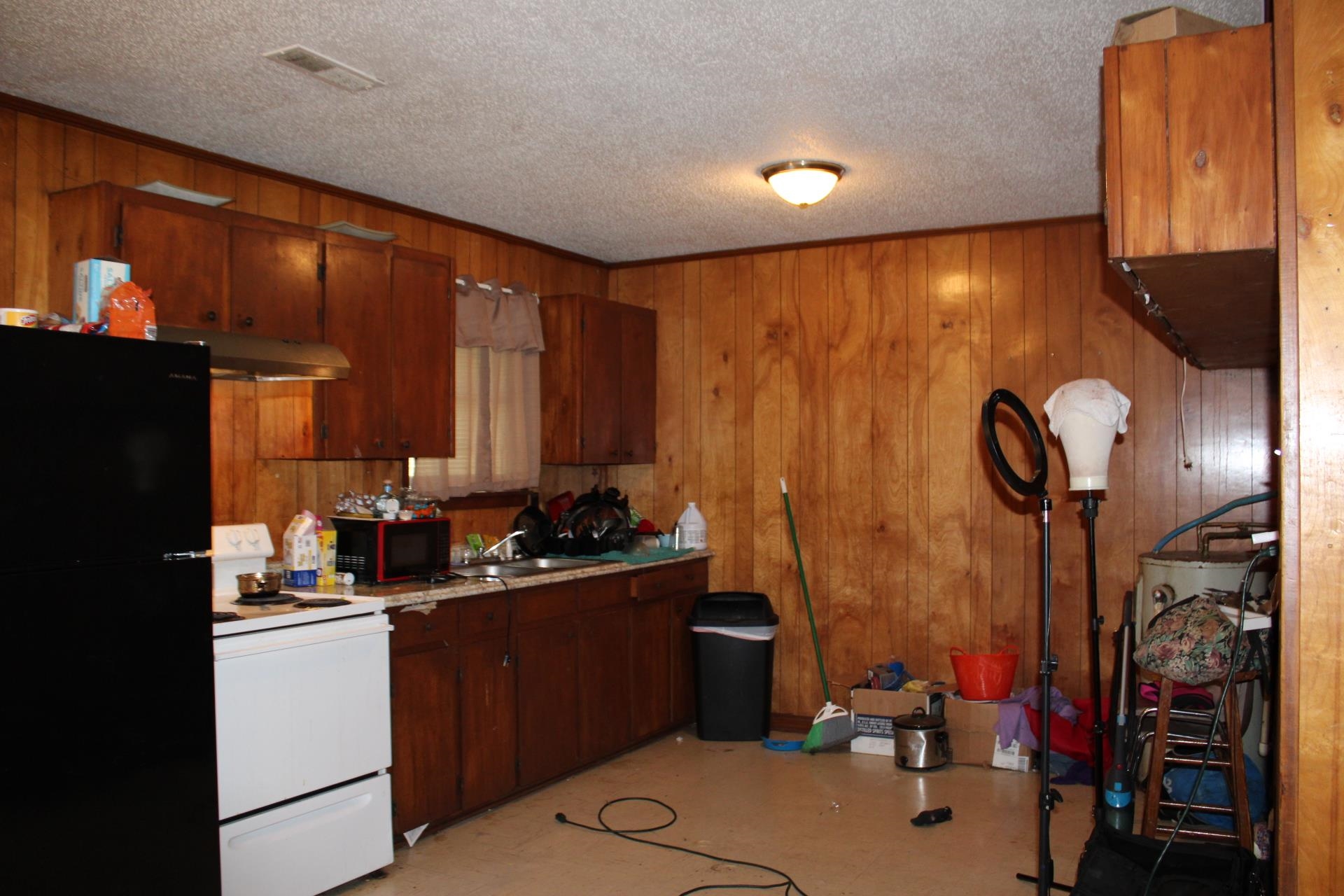 187 Land Avenue Ripley, TN 38063 - Photo 8 of 22 a kitchen with a sink appliances and cabinets