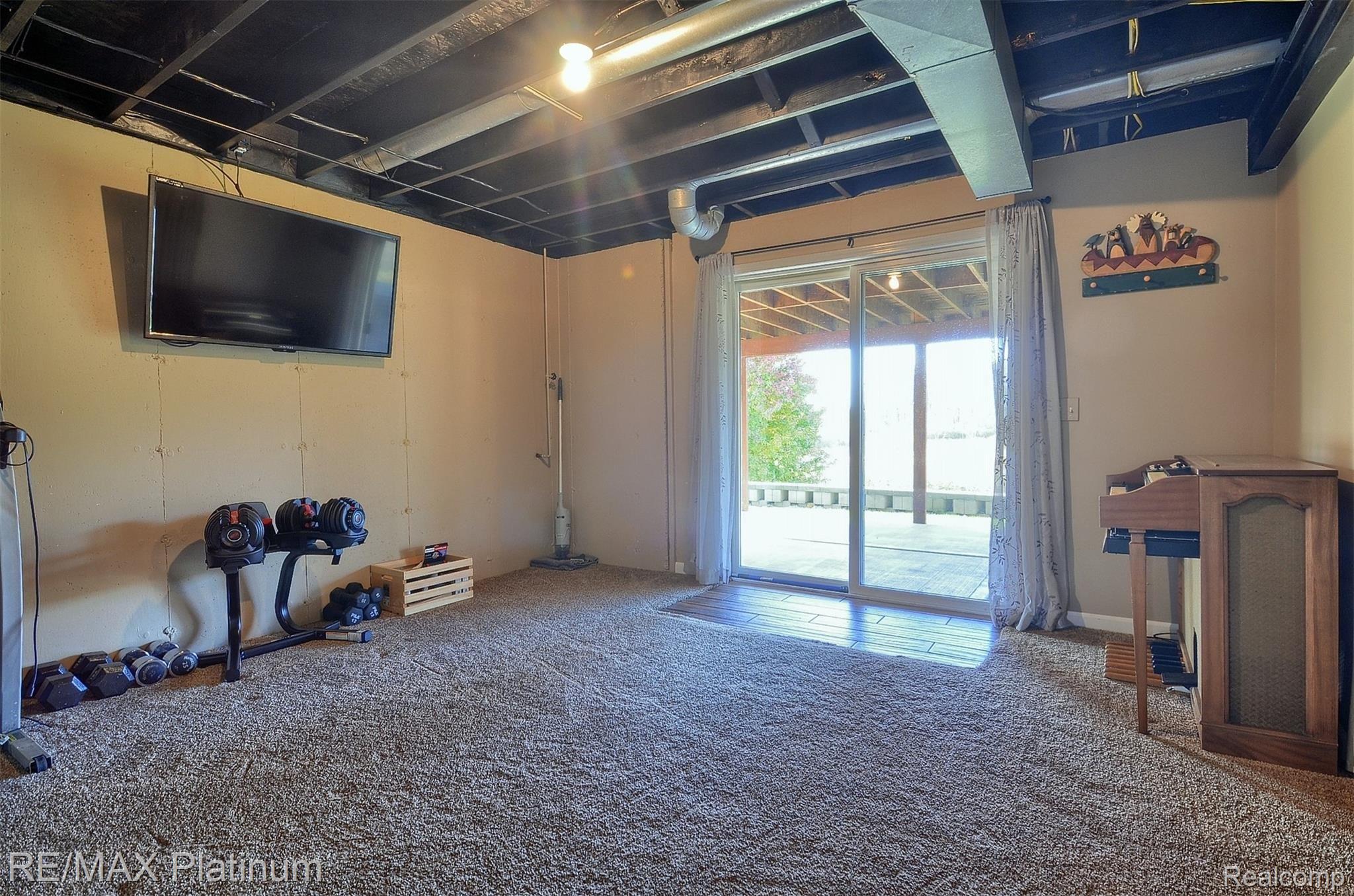 11198 Rolston Road Byron, MI 48418 - Photo 25 of 36 24-Finished Lower Level.jpg