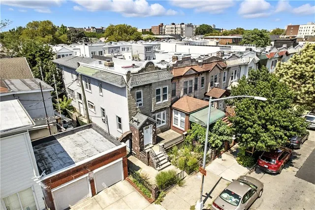 a view of a city with tall buildings