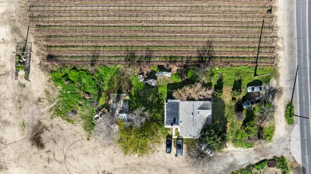 an aerial view of houses with sky view