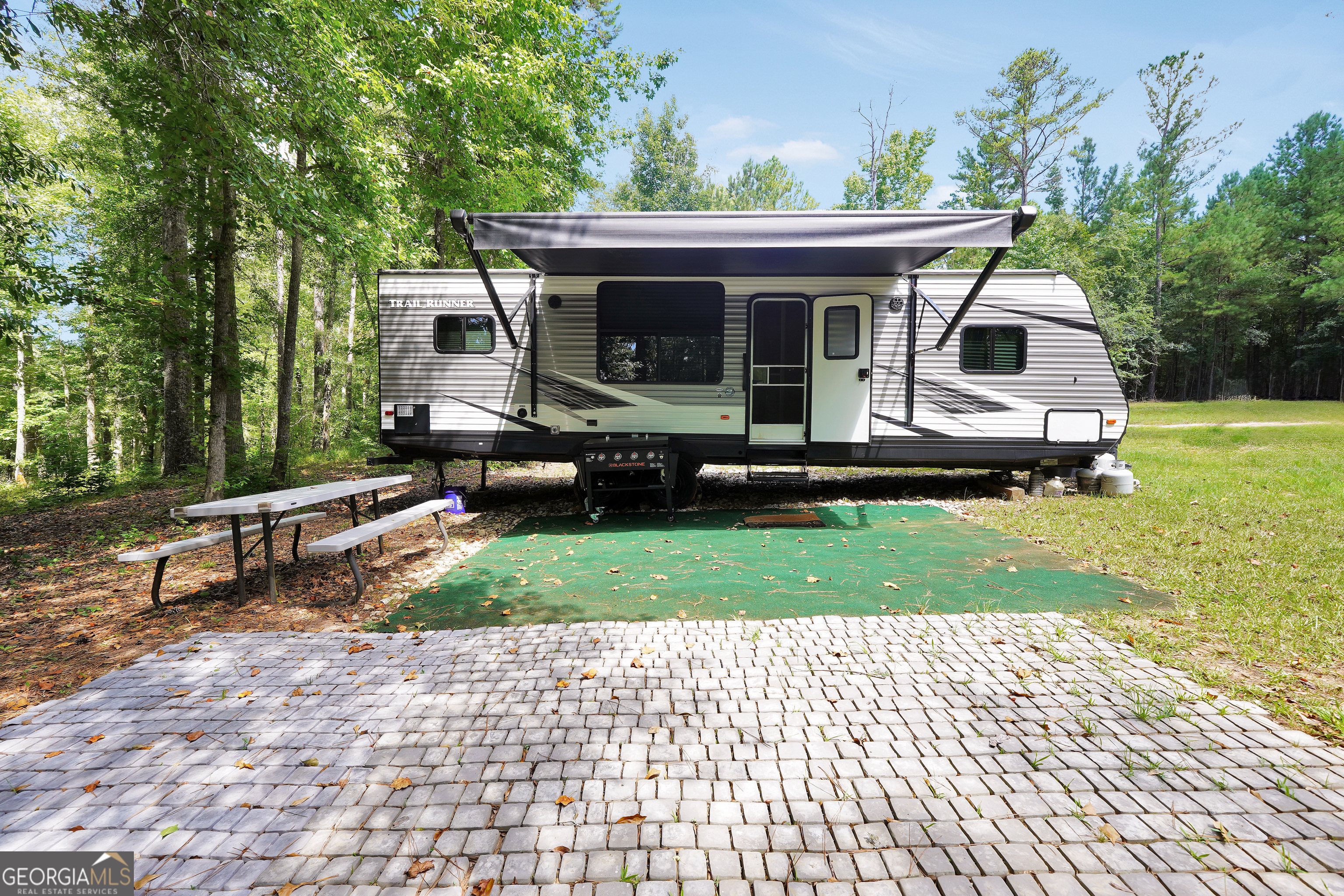 0 Scuffleboro Road Southeast Eatonton, GA 31024 - Photo 26 of 77 a view of a house with a yard