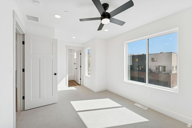252 North Main Street Bountiful, UT 84010 - Photo 22 of 34 Unfurnished bedroom featuring light colored carpet, ensuite bath, a ceiling fan, and recessed lighting