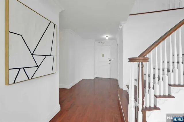 a view of entryway with wooden floor