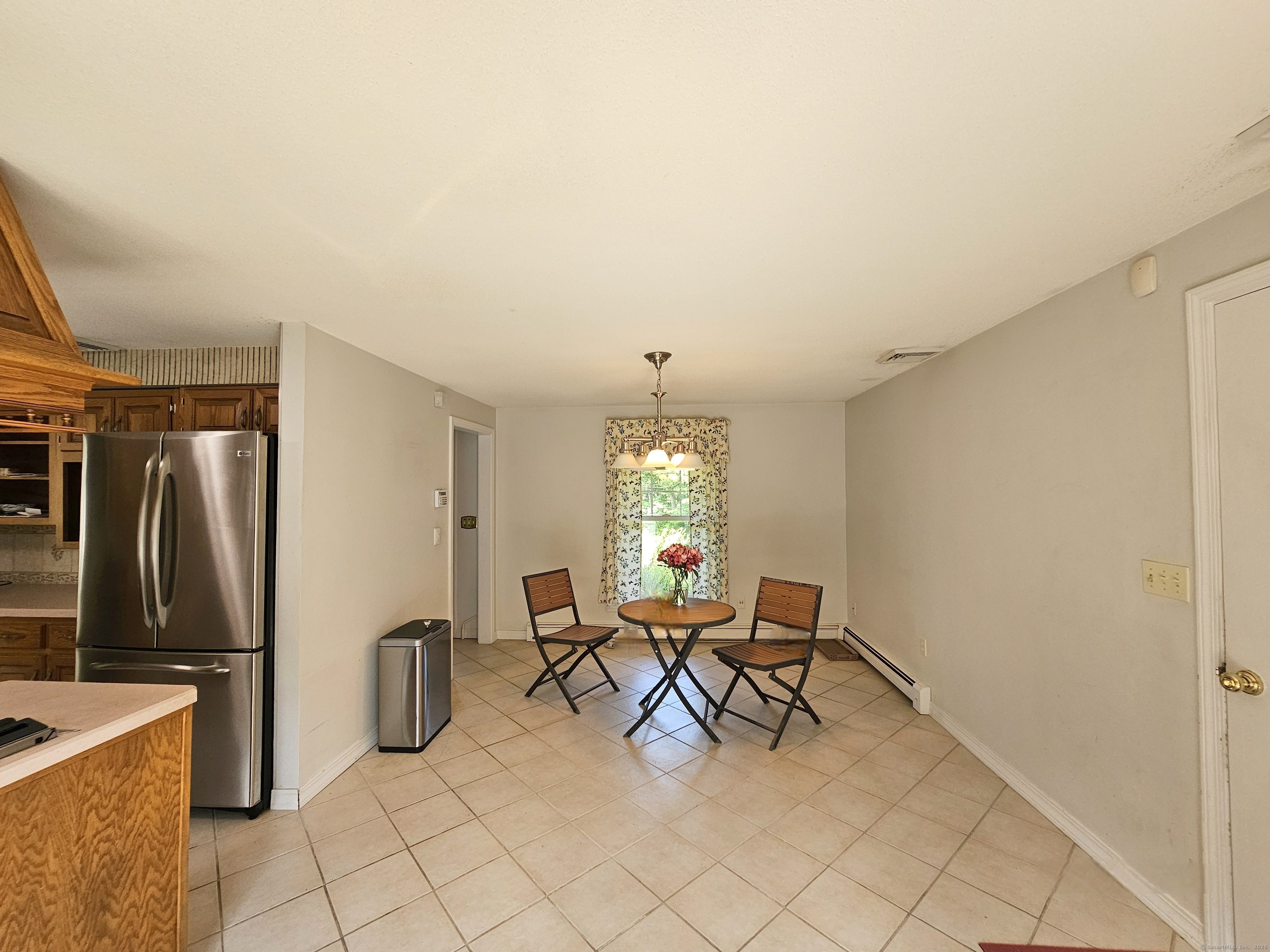 105 Minortown Road Woodbury, CT 06798 - Photo 17 of 35 a view of a livingroom with furniture and windows