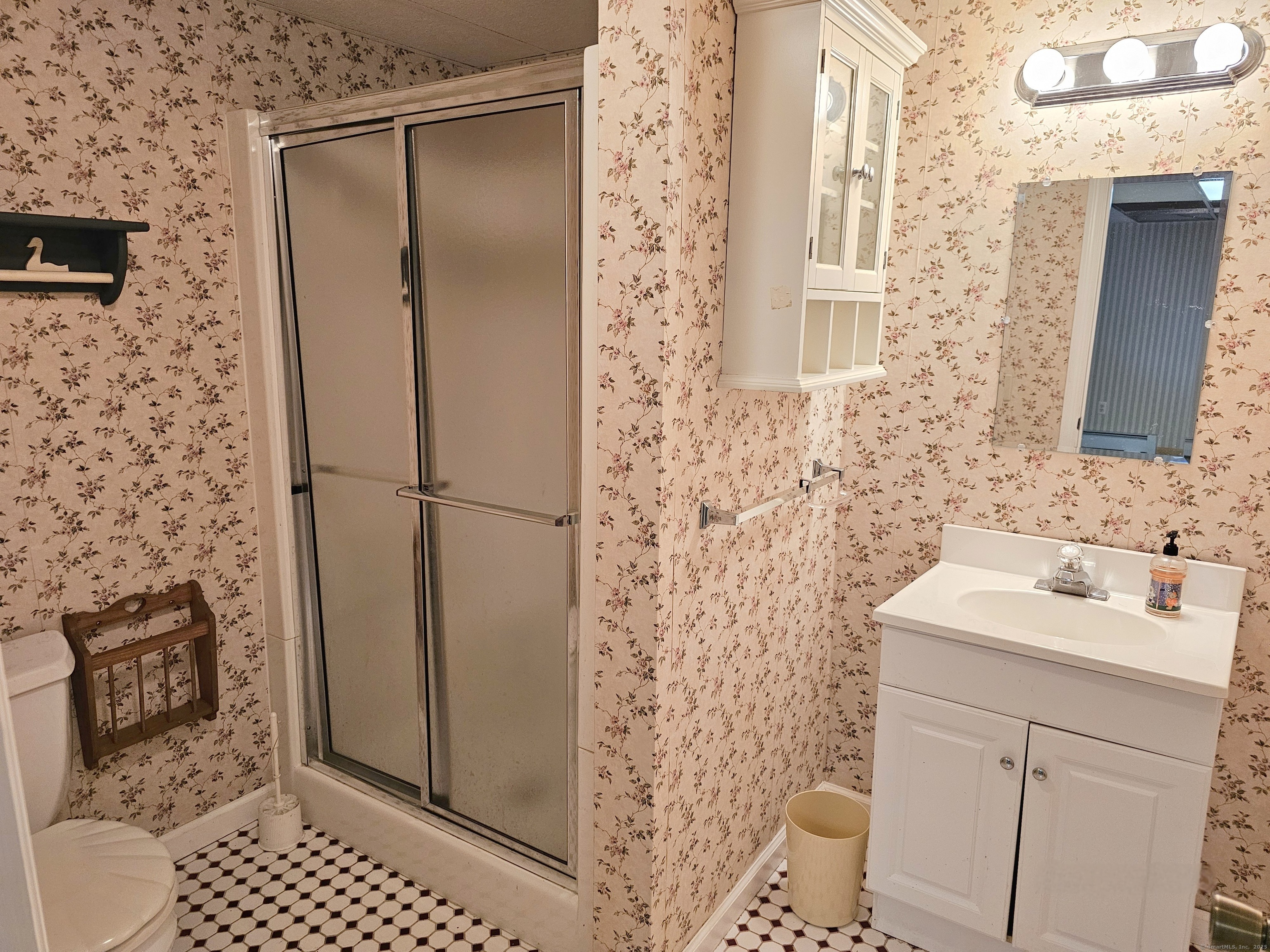 105 Minortown Road Woodbury, CT 06798 - Photo 28 of 35 a bathroom with a shower and a sink a mirror