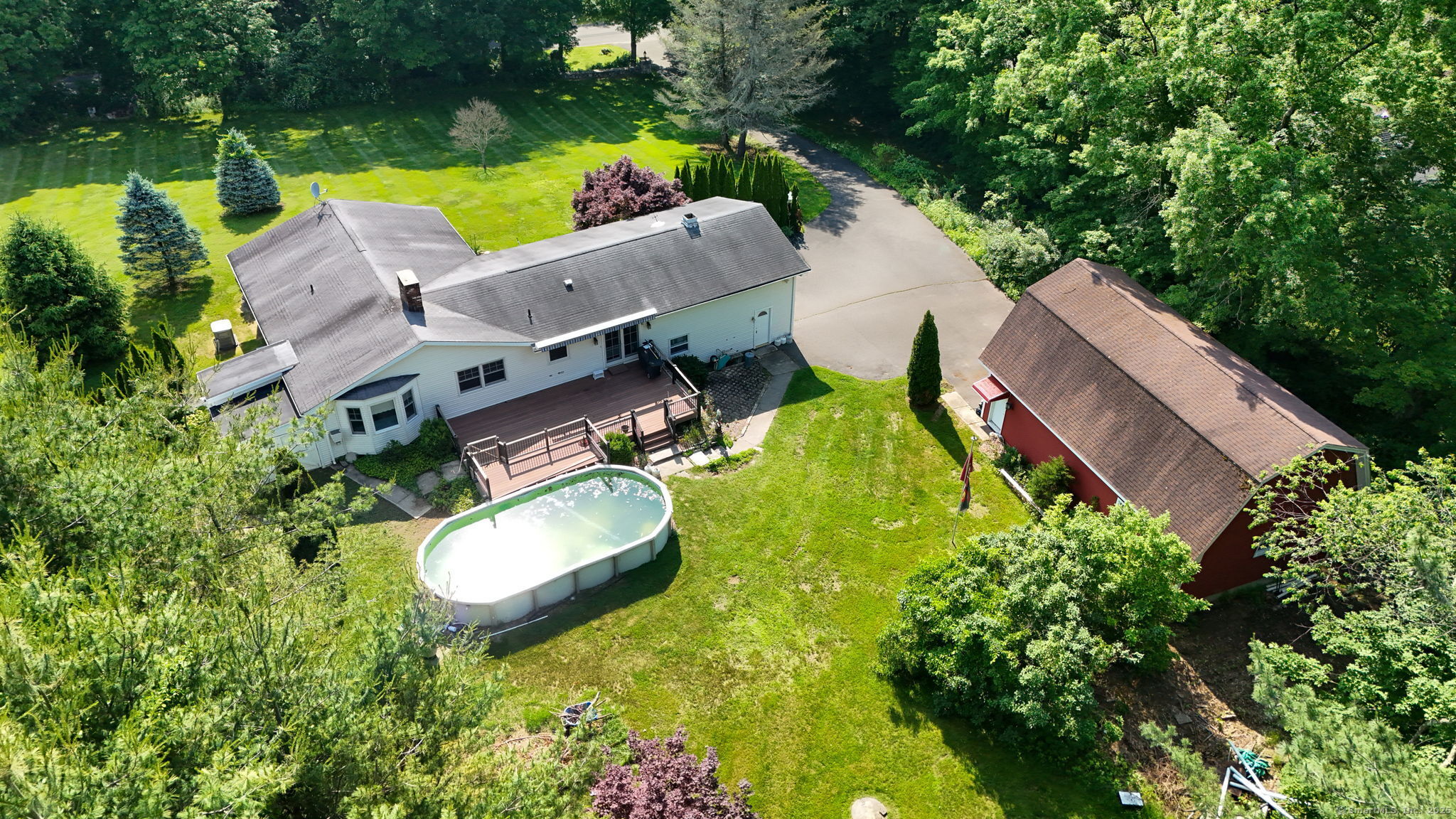 105 Minortown Road Woodbury, CT 06798 - Photo 34 of 35 an aerial view of a house with a garden and lake view