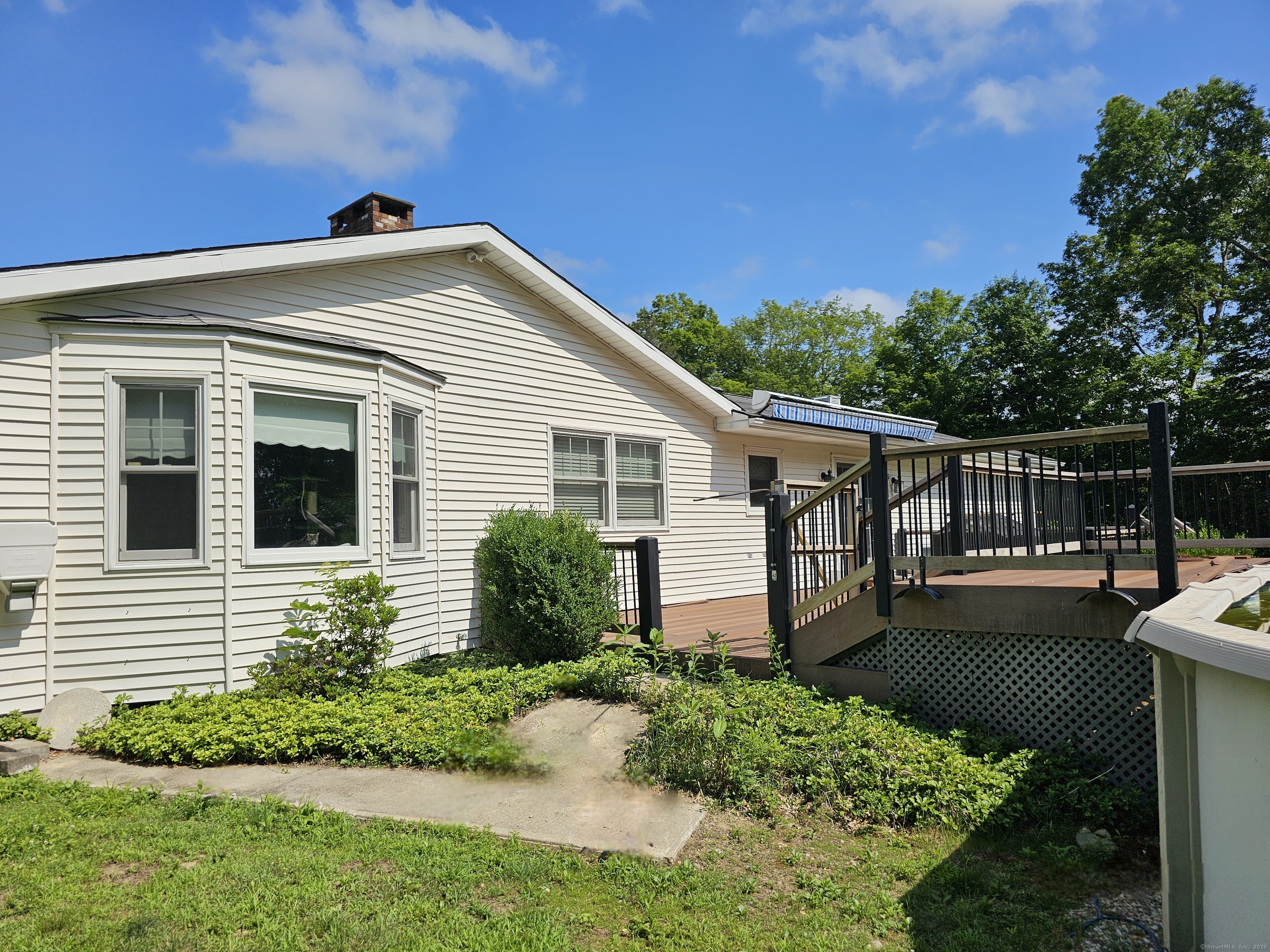 105 Minortown Road Woodbury, CT 06798 - Photo 5 of 35 a front view of house with yard and green space