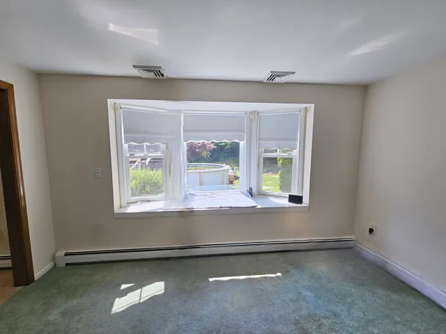 an empty room with a window