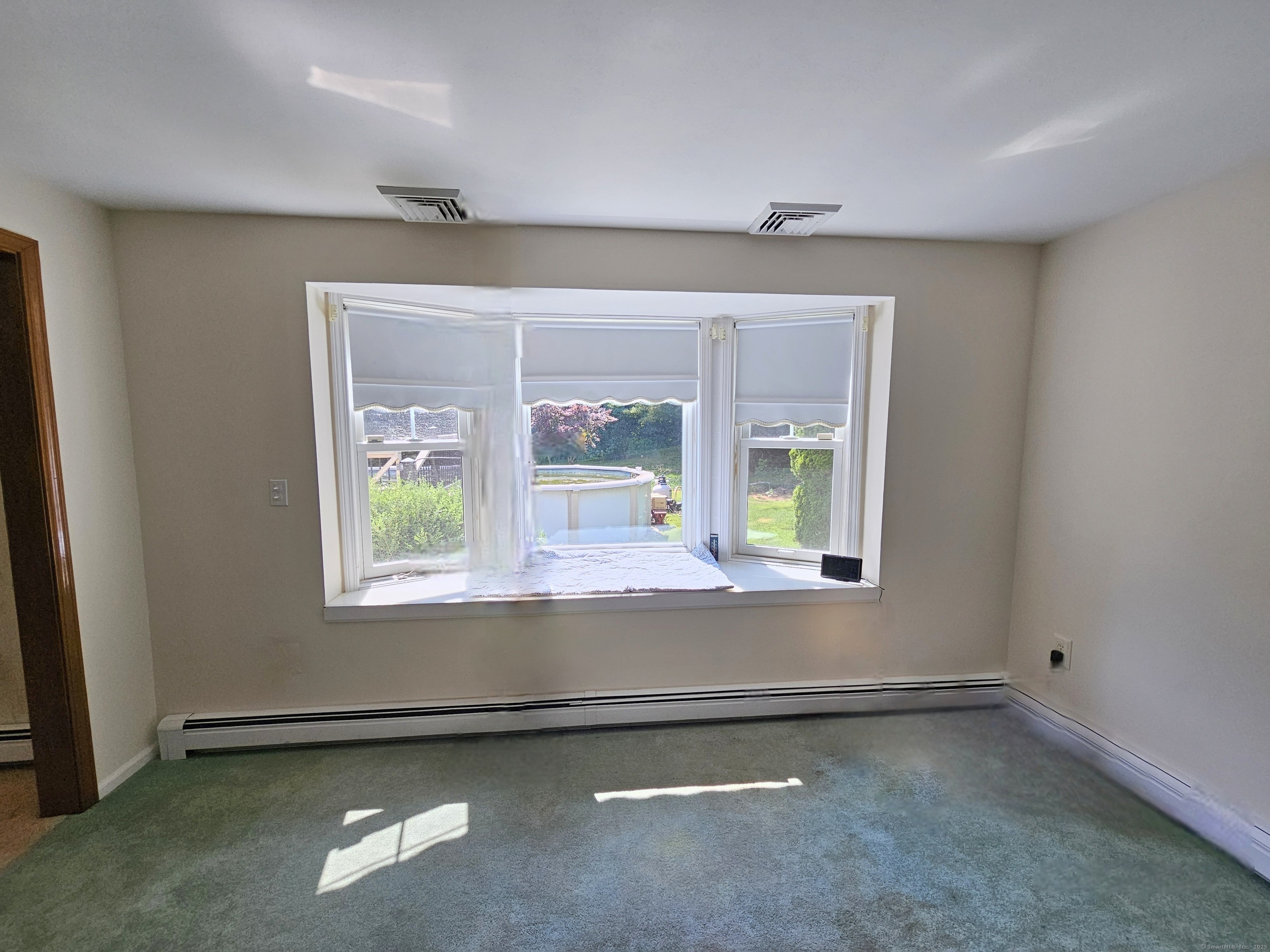 105 Minortown Road Woodbury, CT 06798 - Photo 9 of 35 an empty room with a window