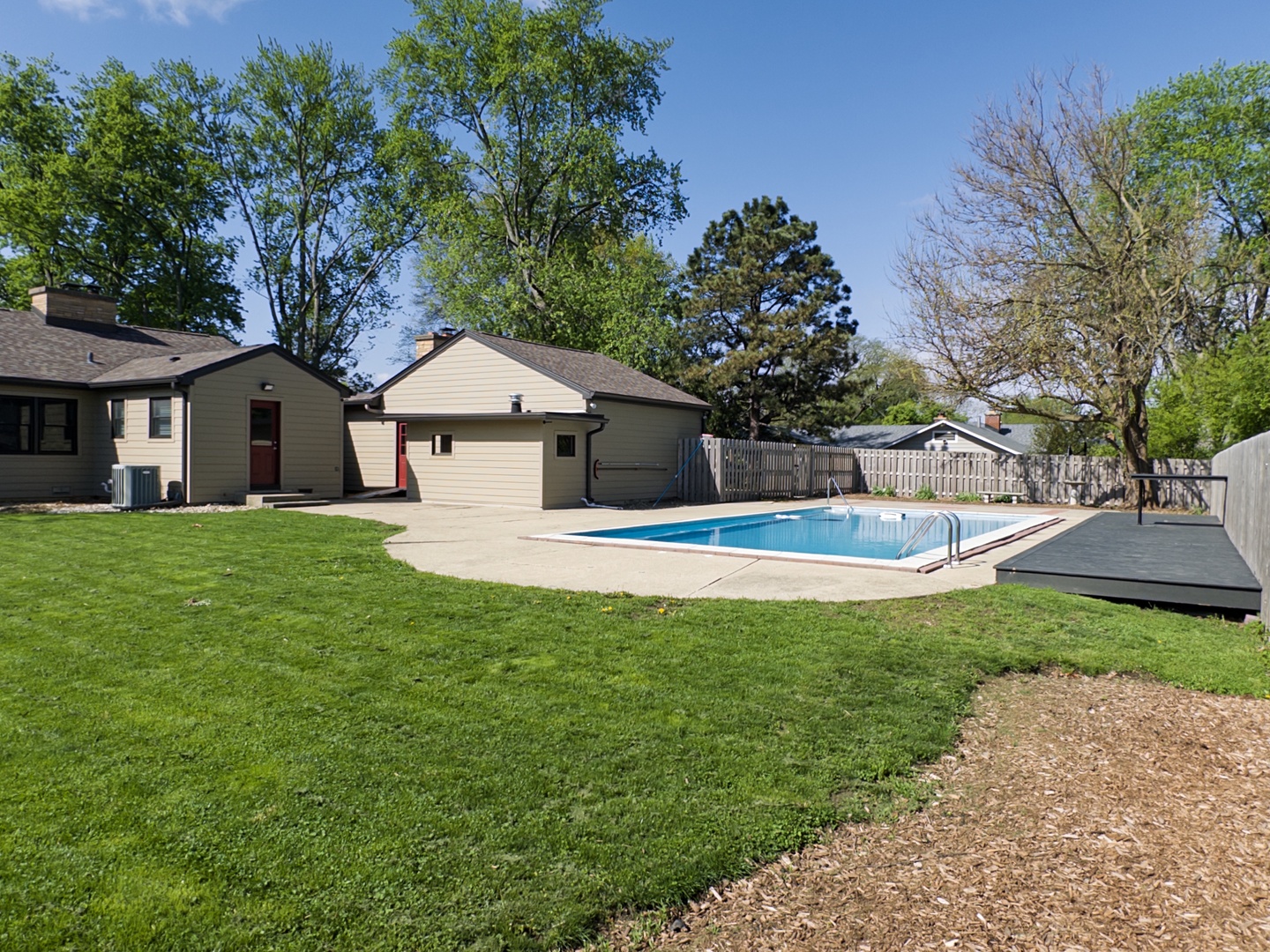 1515 Prairie Street Aurora, IL 60506 - Photo 28 of 31 a front view of a house with a garden