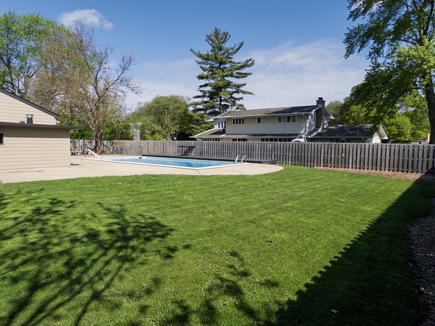1515 Prairie Street Aurora, IL 60506 - Photo 30 of 31 a view of a house with a swimming pool